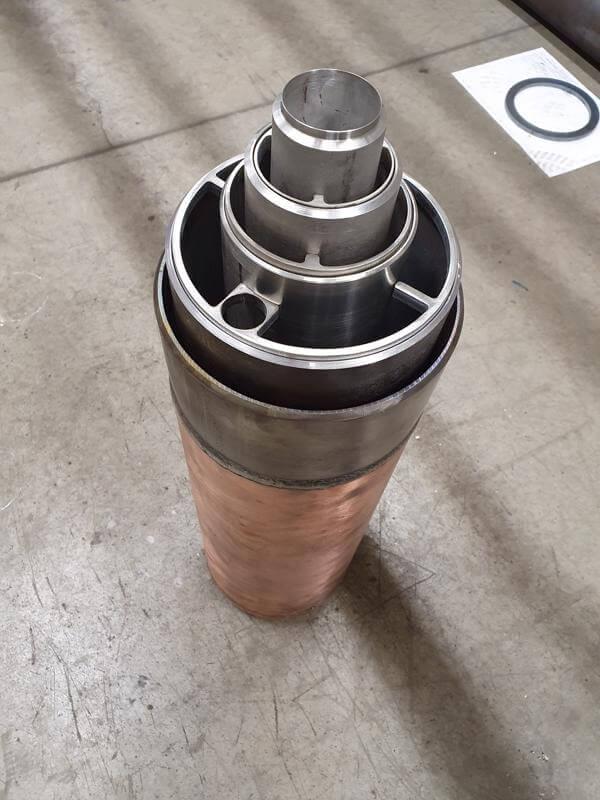 33 - Copper head of the vacuum chamber burner